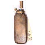 A copper pistol size powder flask, of tapering flattened facetted form with rounded corners (similar