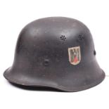 A Third Reich Police pattern double decal steel helmet of the DRK (German Red Cross), with matt