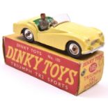Dinky Toys Triumph TR2 (105). A scarce 'Touring' finish example in lemon yellow with pale green