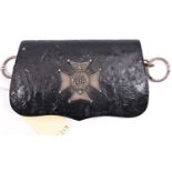 A Vic black PL pouch, Maltese Cross flap badge with VR cypher in crowned Garter and motto to the