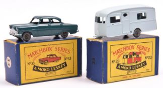 2 Matchbox Series. No.33 Ford Zodiac, in dark green with tow hook and metal wheels. Plus a No.23
