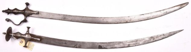 A 19th century tulwar, curved blade 29”, with line of simple decoration, iron hilt with