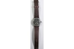 D marked Titus wristwatch. Serial D891542. Base metal case, no plating remaining, 32mm without