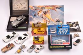 Quantity of James Bond related toys by various makers. A Scalextric Aston Martin DB5 (1st of 3