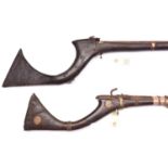 2 Indian matchlock guns from Sindh, 55” and 62” overall, with typical broad curved butts, one butt