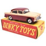 Dinky Toys Humber Hawk (165). An example with maroon roof and lower body, cream upper body, spun
