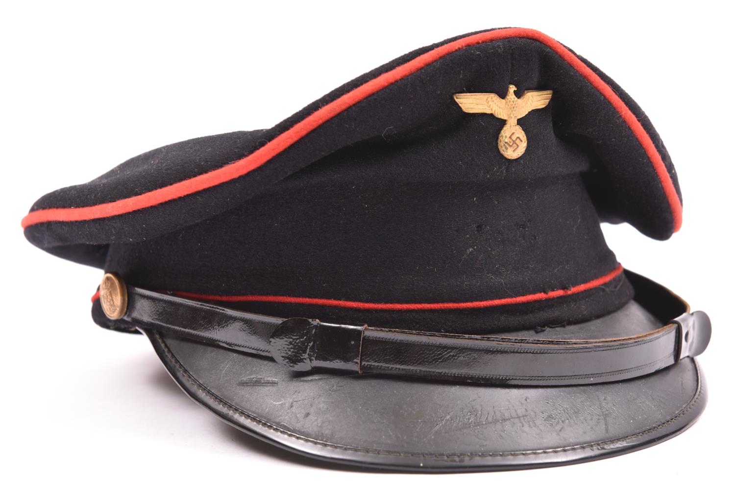 A Third Reich period peaked cap, believed to be to the NSB (Dutch Nazi Party), black with red