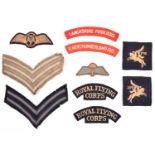 Cloth insignia: pair Royal Flying/Corps titles and single R Northumberland Fus and Lancashire