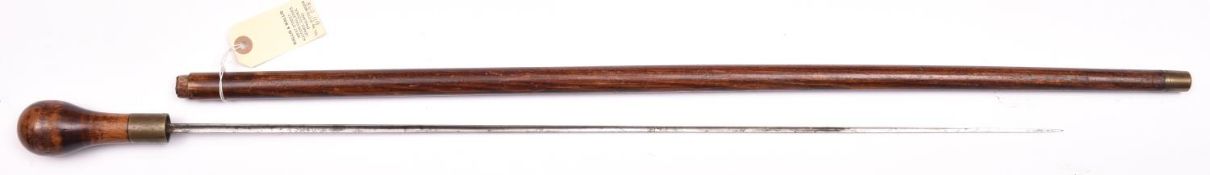 A 19th century swordstick, slender hollow triangular section blade 27”, plain polished darkwood