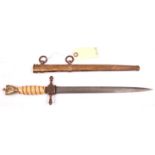 A Third Reich naval officer’s dagger, plain blade with scratch decorated finish, the hilt with