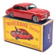 Matchbox series No.65 Jaguar 3.8 sedan. Example in maroon with green windows and grey plastic