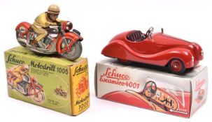 2x Schuco tinplate clockwork vehicles. An original issue Motodrill 1006 racing motorcycle. Red