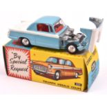 Corgi Toys Triumph Herald Coupe (231). Example in light blue and white, with red interior, dished