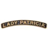 A reproduction locomotive nameplate LADY PATRICIA. A cast brass plate with black painted background.