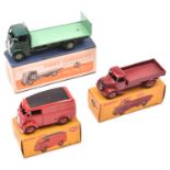 3 Dinky Toys. Guy Flat Truck with tailboard (513), dark green cab and chassis with mid green rear