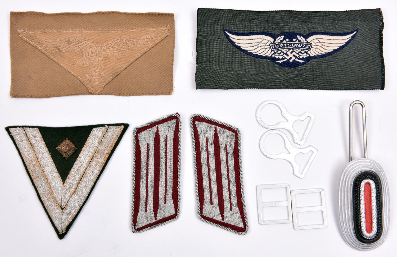 Third Reich insignia etc: Luftwaffe tropical breast eagle on triangular patch with section of