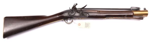 A rare late 18th century brass barrelled flintlock blunderbuss with elliptical muzzle and spring