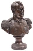 A composition head and shoulders bust of Napoleon, well modelled, bare headed in full dress with