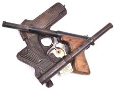 A 1920’s-1930’s .177” German Diana tinplate air pistol, with tip up barrel and air chamber in the