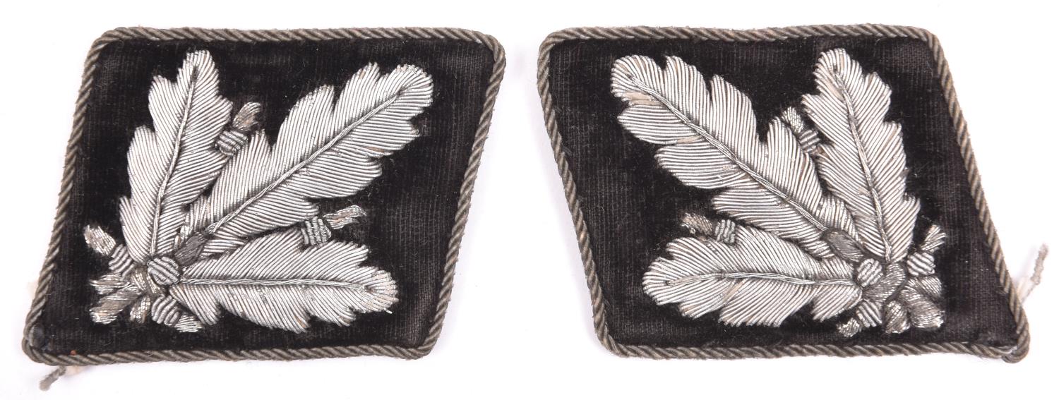 A pair of Third Reich collar patches for an SS Brigadefuhrer und Generalmajor der Waffen SS. GC