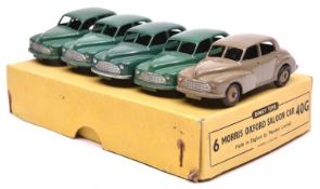 A Dinky Toys Trade Box for 6 Morris Oxford Saloon Car (40G). Containing 5 examples, 4 in dark