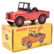 A scarce Dinky Toys Land Rover (340). A late example in red with red plastic wheels and black tyres,