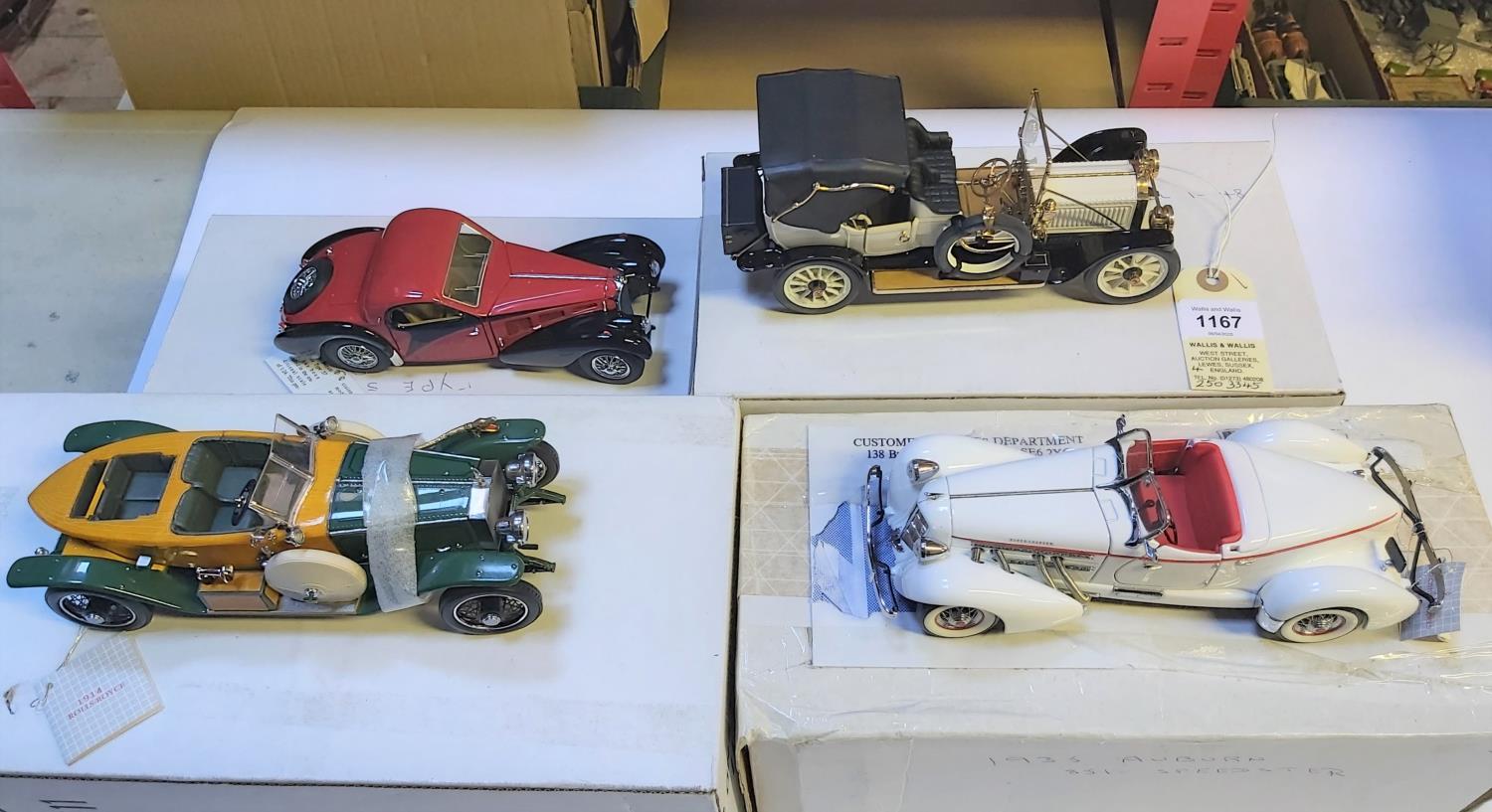 4 Franklin Mint vehicles. 1912 Packard Victoria Model 1-48. In white. 1914 Rolls Royce Silver Ghost.