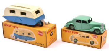 2 Dinky Toys. Riley Saloon (158) in light green with mid green wheels and black tyres. Plus a