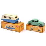 2 Dinky Toys. Riley Saloon (158) in light green with mid green wheels and black tyres. Plus a