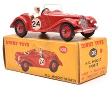 A Dinky Toys M.G. Midget Sports (102). Example in red with tan interior, RN24 and red wheels with