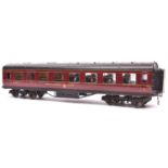 An O Gauge Exley K5 type LMS Restaurant Car. In lined maroon livery. GC-VGC, non-original bogies and