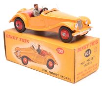 Dinky Toys M.G. Midget Sports (102). A scarce example in deep yellow with bright red interior and
