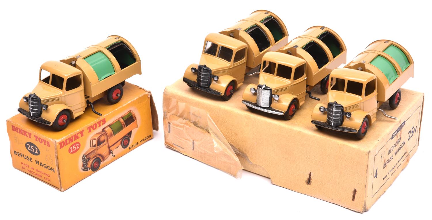 A Dinky Toys Trade Box for 4x Bedford Refuse Wagon (25v). Containing 4 examples in fawn with green