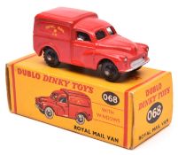 A Dublo Dinky Royal Mail Van (068). A Morris 1000 van in red livery with black knobbly plastic