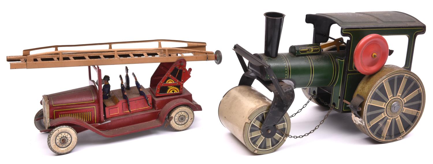 2x Tipp & Co. Germany tinplate clockwork vehicles. A Fire Engine in red with extending ladder and