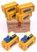 A Scarce Dublo Dinky Trade Box of Six Austin Taxi (067). All in cream and dark blue with grey