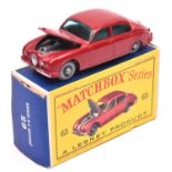Matchbox Series No.65 Jaguar 3.8 Sedan. In red with green windows, grey plastic wheels and silver