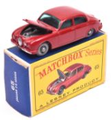 Matchbox Series No.65 Jaguar 3.8 Sedan. In red with green windows, grey plastic wheels and silver