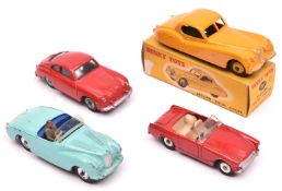 4 Dinky Toys. Jaguar XK120 Coupe (157). An example in deep yellow with lighter yellow wheels,