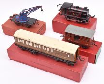 10x Hornby O gauge railway items. A No.40 clockwork BR 0-4-0T locomotive, 82011, in lined black