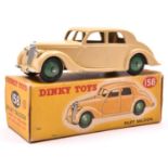 Dinky Toys Riley Saloon (158). An example in cream with mid green wheels and black tyres. Boxed,