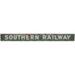 A Southern Railway poster board header. Green and white enameled sign with rounded lettering. Length