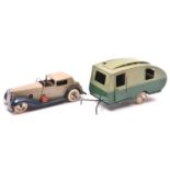 2 Tri-ang Minic tinplate toys. A clockwork Town Coupe No.7m An example in light grey with dark