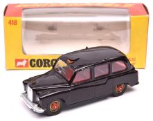 A rare Corgi Whizzwheels Austin London Taxi (418). Ex Mike Tottle (Corgi). In very dark maroon