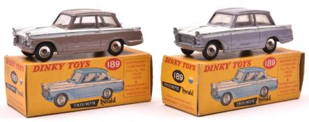 2 Dinky Toys Triumph Herald promotional models. One in lilac and white and the other in pale mauve
