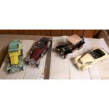 4 Franklin Mint vehicles. 1910 Cadillac Model Thirty Roadster. In black. 1937 Cord 812 Phaeton