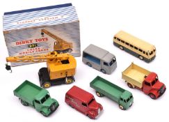 7 Dinky Toys. Coles Mobile Crane (971). In yellow with black chassis. Bedford End Tipper. In red