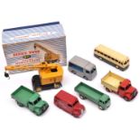 7 Dinky Toys. Coles Mobile Crane (971). In yellow with black chassis. Bedford End Tipper. In red