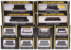 A quantity of Graham Farish N gauge railway. A BR Standard 4MT 2-6-4 tank RN 80079 in lined black