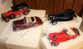 4 Franklin Mint vehicles. 1935 Mercedes-Benz 770K Grosser. In red. Mercedes-Benz 500K Special